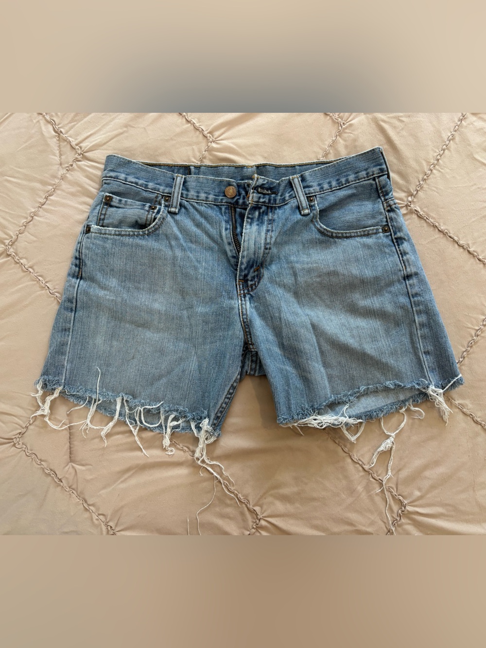 Levi's Raw Hem Light Blue Denim Shorts